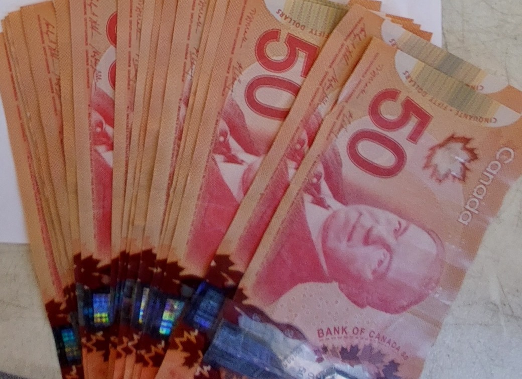 A fan of fifty-dollar bills